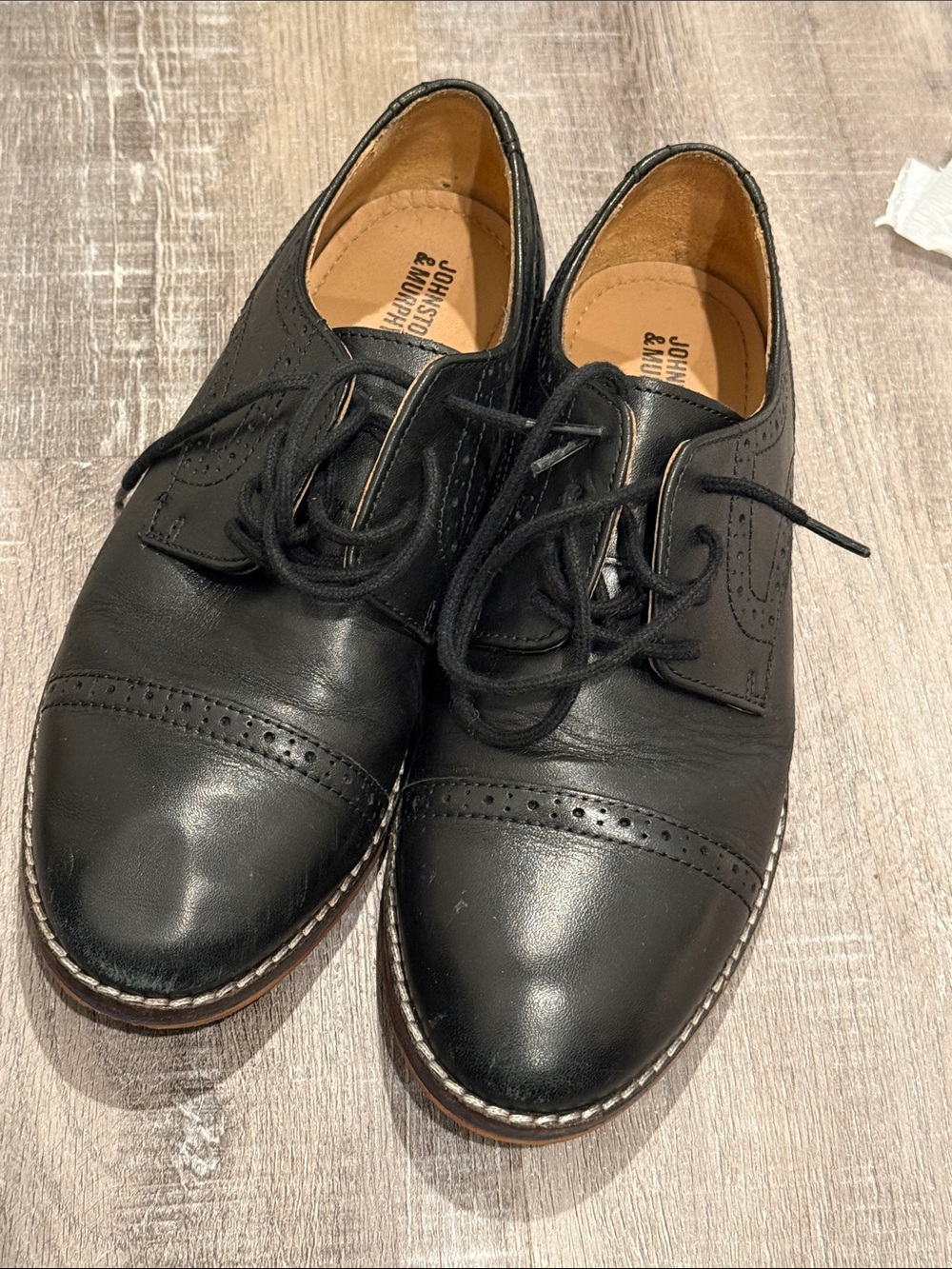 Johnston Murphy boys black dress shoes. Worn 5 times and in excellent condition.